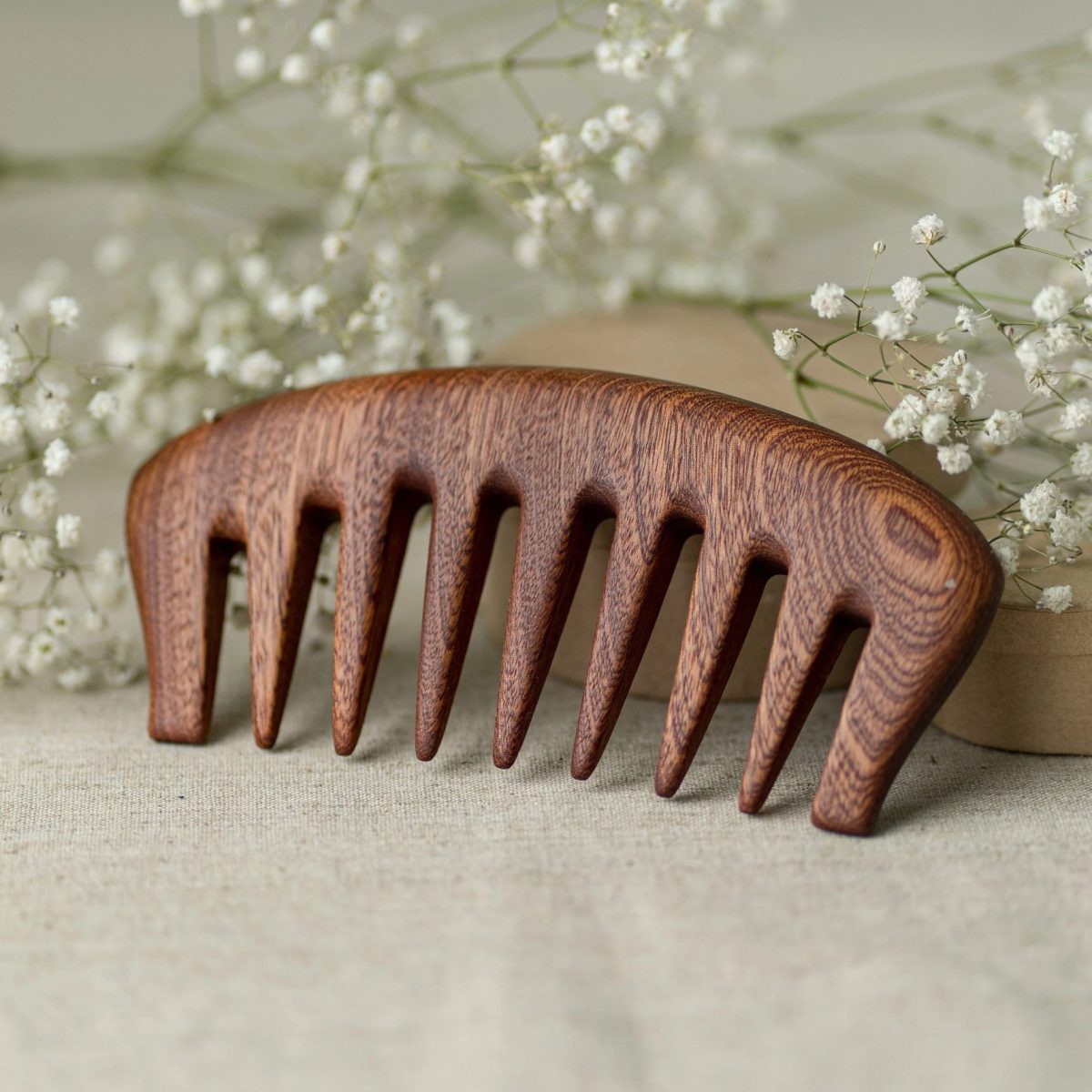Witch style wide tooth wooden comb from mahogany – handmade in Lithuania